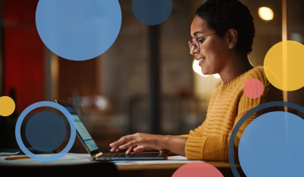 Woman typing on computer with circles around her