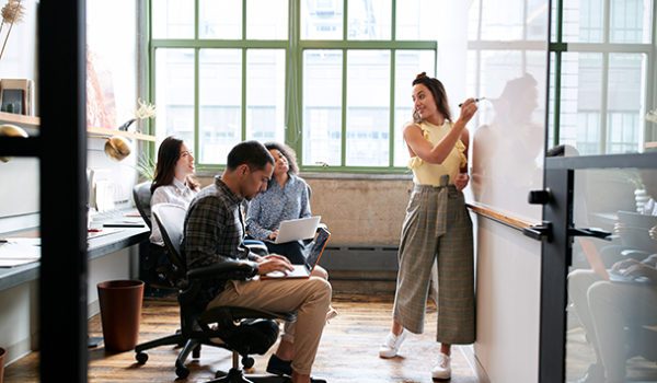 woman using whiteboard